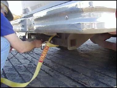 Attaching tow strap to truck - Mike Nelson