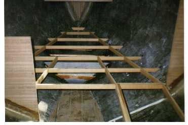 Forward Berth Framing – This is the roughed-in framing for the v-berth showing the partial bulkheads on either side, the bow tank and the forepeak bulkhead.