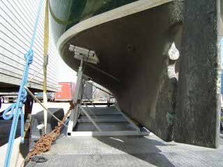 Chains are used to secure the cradle in place, ropes and straps secure the Flicka to the cradle and trailer