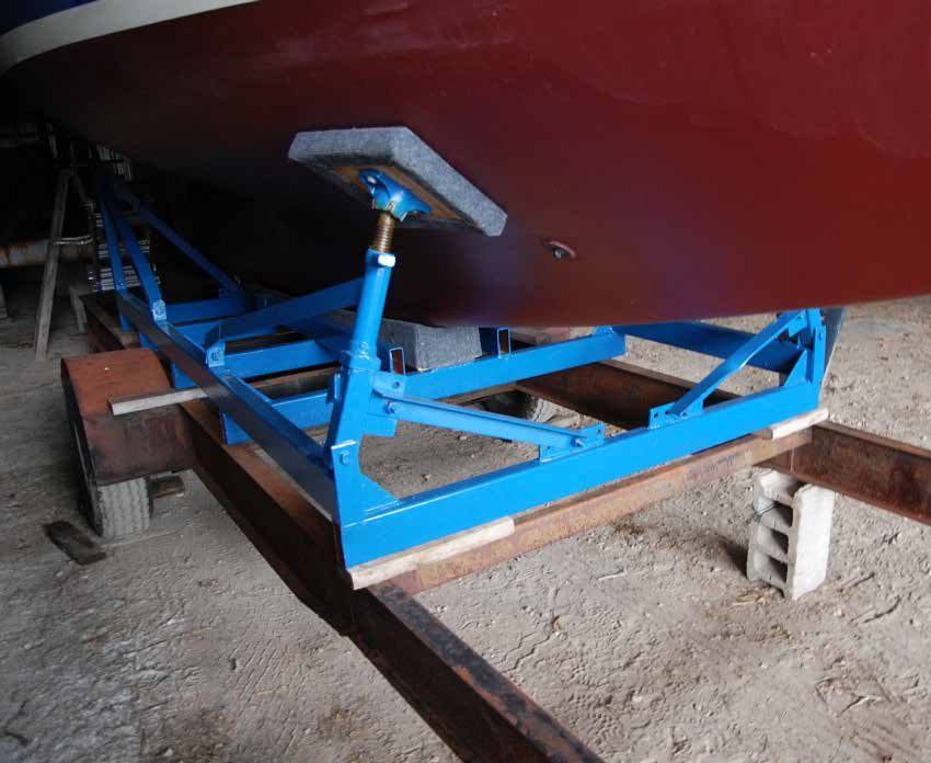 Resting on a modified Jowi boat cradle and a yard trailer, s/y ZANZIBAR is stored for the winter