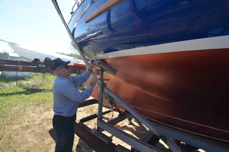 After centering , the four support pads were adjusted to the hull